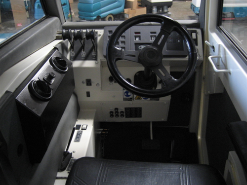 Reconditioned Tennant 810 rider sweeper